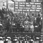 Sir James Joynton Smith, former Lord Mayor of Sydney, addresses the crowd on the opening day of the Second Peace Loan campaign, 6 August 1920. A banner in the background reads: ‘WE Cried for men: THEY answered WE Cheered: THEY Sailed away WE Slept in peace: THEY Suffered It’s OUR turn: WE MUST PAY!’ PN-001804