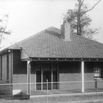 The first war service home in Australia, 32 Kennedy Avenue, Canterbury (present-day Belmore), Sydney, August 1919. The foundation stone laid by Denison Miller can be seen in the bottom, left-hand corner of the façade. PN-002069