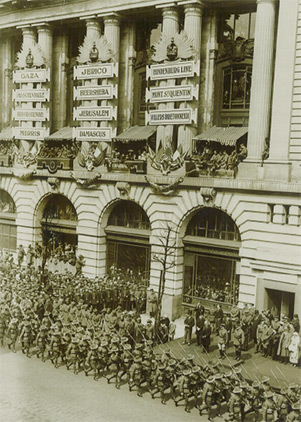 Photo of Edward, the Prince of Wales, takes the salute for Anzac Day outside Australia House, London, which housed a branch of the Commonwealth Bank of Australia, 25 April 1919.
